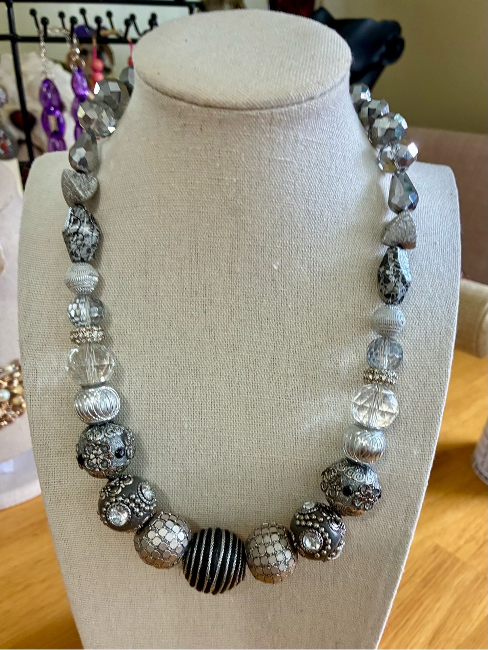 Chunky black, silver and clear beaded statement necklace.